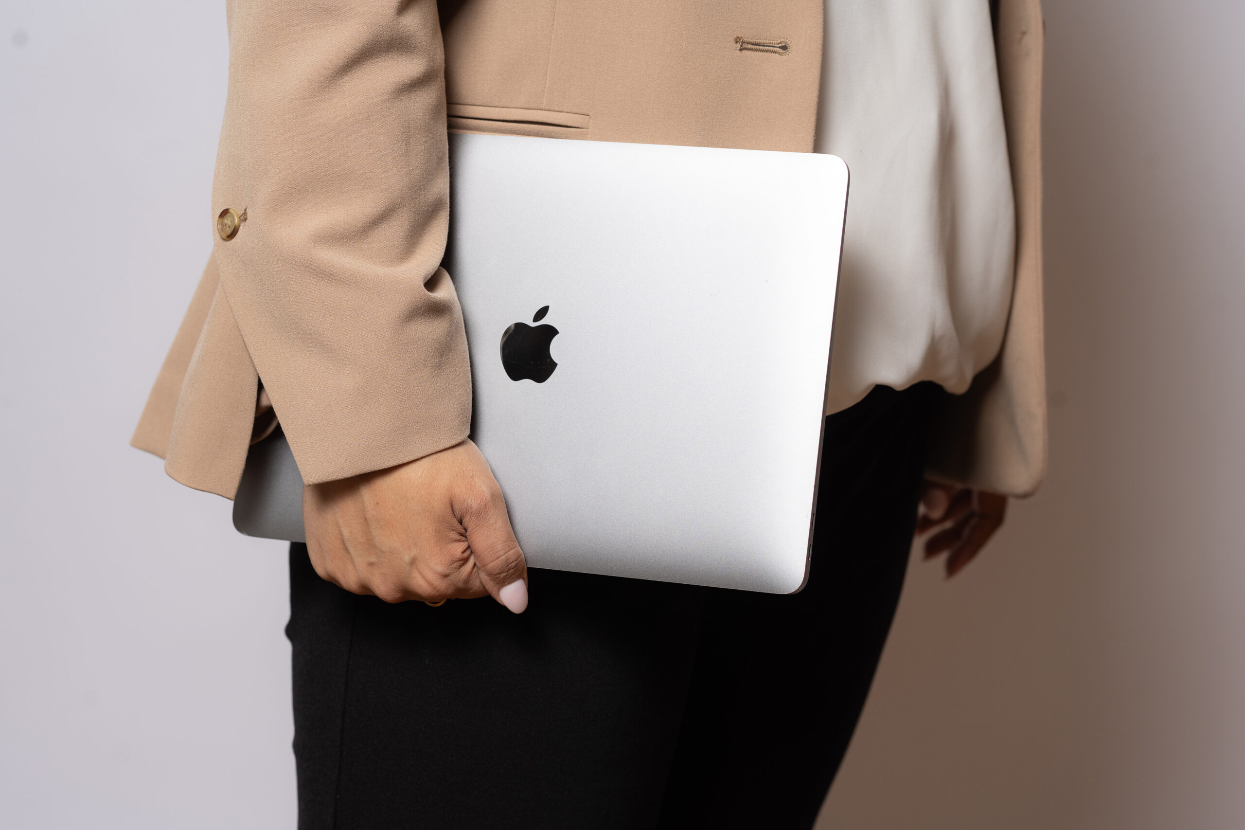 Woman holding a laptop