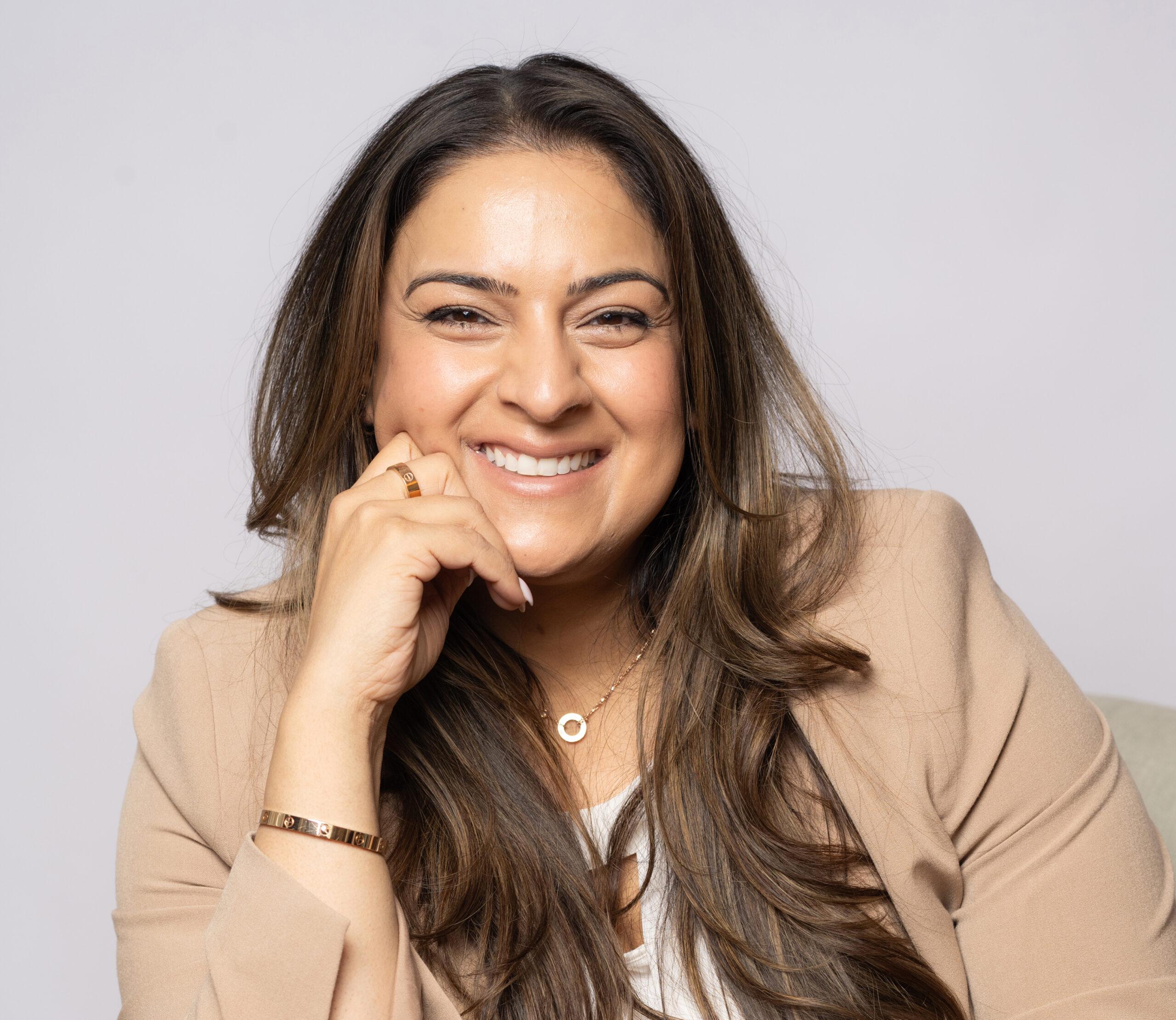 woman smiling and embracing her CEO mindset
